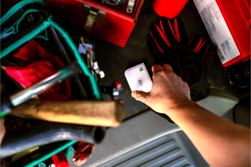 Hand reaching for a tap to pay device