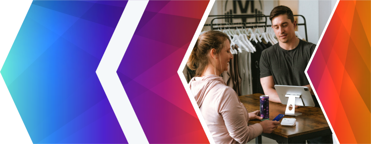 Cashier ringing up customer in clothing store